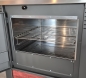 Preview: Küchenofen Holzherd PANONIA Kacheln bordeaux, linke Version - 8,5 kW Dauerbrandherd