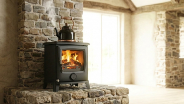 Preview: EEK A+ Kleiner, robuster Gusskaminofen LUMI I mit 4,9 kW